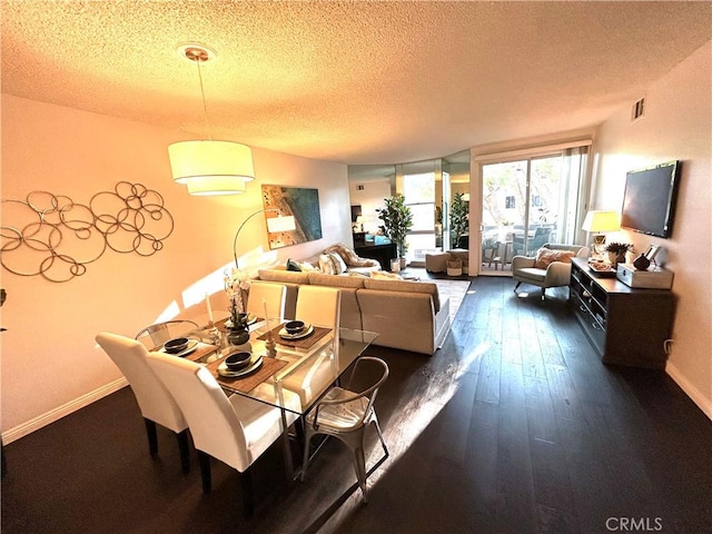 4242 Stansbury Ave Unit 203, Sherman Oaks, CA 91423 - dining room featuring a textured ceiling and dark wood-type flooring