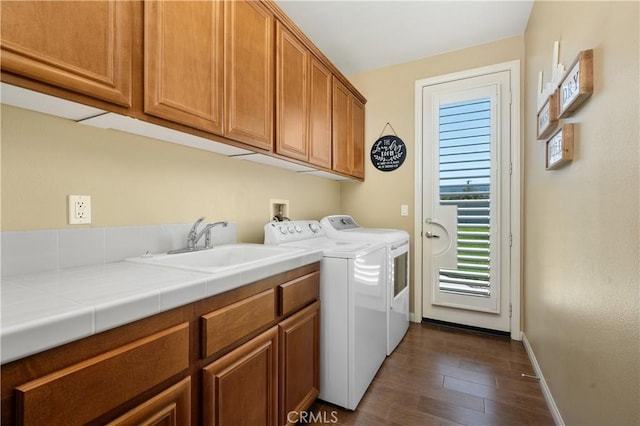 41798 Aviv Ct, Murrieta, CA 92562 - washroom with washing machine and dryer, cabinet space, and dark wood finished floors