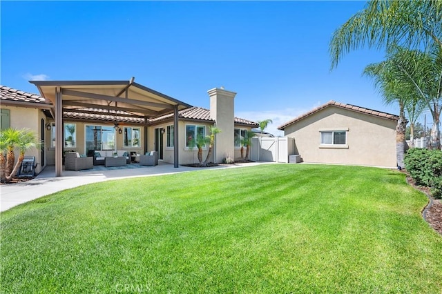 41798 Aviv Ct, Murrieta, CA 92562 - back of property with an outdoor hangout area, stucco siding, a tile roof, and a chimney