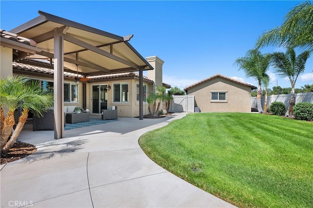 41798 Aviv Ct, Murrieta, CA 92562 - view of yard with a patio area, an outdoor hangout area, and a gate
