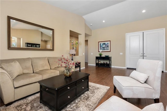 41798 Aviv Ct, Murrieta, CA 92562 - living area featuring dark wood finished floors, vaulted ceiling, and recessed lighting