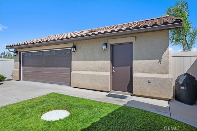 41798 Aviv Ct, Murrieta, CA 92562 - view of front facade with driveway, a tiled roof, a garage, and stucco siding