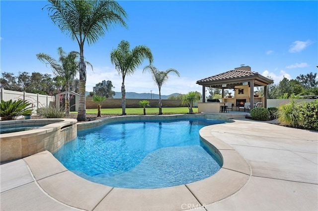 41798 Aviv Ct, Murrieta, CA 92562 - view of swimming pool with a gazebo, a patio area, a pool with connected hot tub, an outbuilding, and an outdoor bar