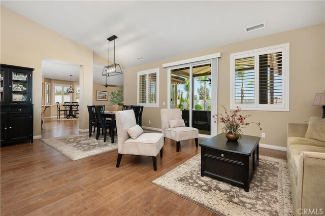 41798 Aviv Ct, Murrieta, CA 92562 - living area with lofted ceiling and wood finished floors