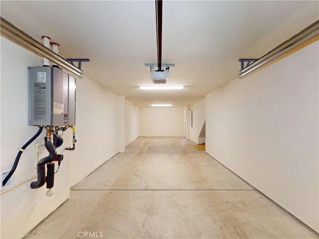 2603 Winston Ct, Arcadia, CA 91007 - garage featuring tankless water heater and a garage door opener