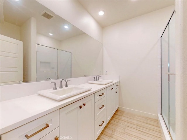 2603 Winston Ct, Arcadia, CA 91007 - bathroom with double vanity, a stall shower, and recessed lighting