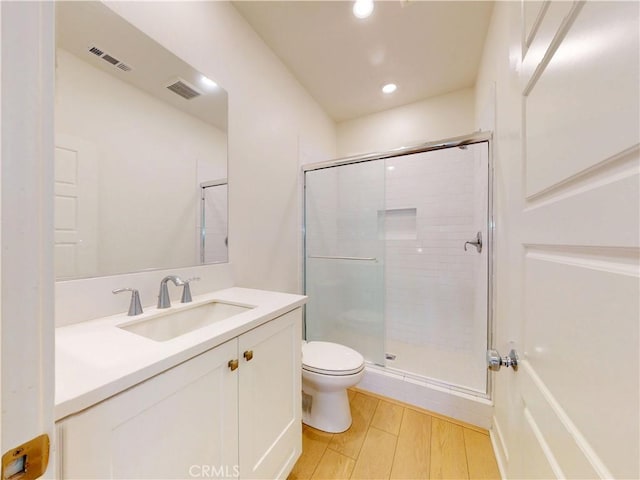 2603 Winston Ct, Arcadia, CA 91007 - full bathroom with vanity, a stall shower, recessed lighting, and wood finished floors