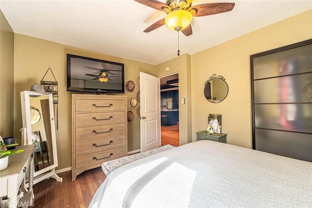 8638 Yorktown Ave, Los Angeles, CA 90045 - bedroom featuring dark wood-style flooring and ceiling fan