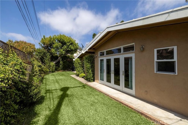 2911 Walker Lee Dr, Rossmoor, CA 90720 - view of grassy yard featuring french doors