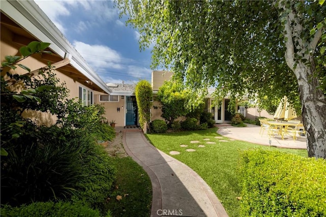 2911 Walker Lee Dr, Rossmoor, CA 90720 - view of green lawn featuring a patio