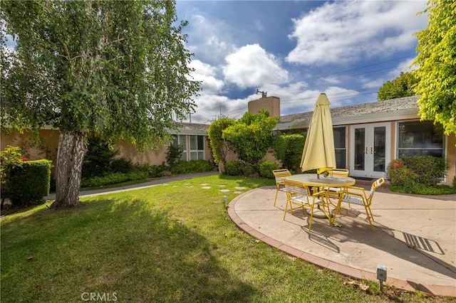 2911 Walker Lee Dr, Rossmoor, CA 90720 - view of green lawn with french doors and a patio area