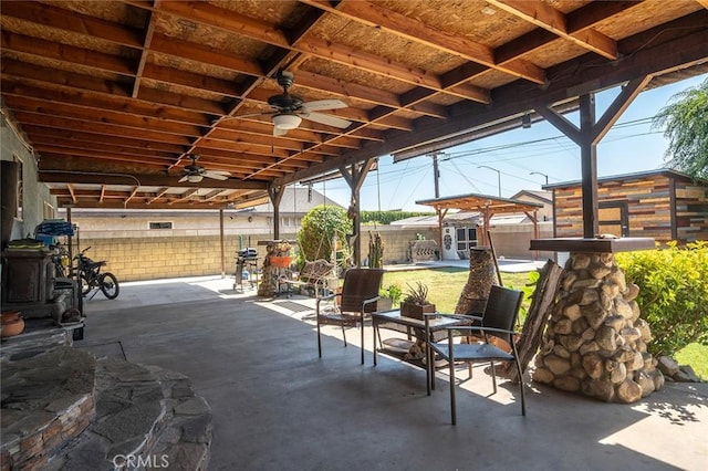 117 N Morada Ave, West Covina, CA 91790 - fenced backyard featuring a ceiling fan, a patio, and an outbuilding