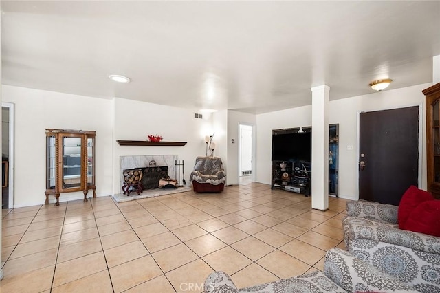 117 N Morada Ave, West Covina, CA 91790 - living area with light tile patterned flooring and a premium fireplace