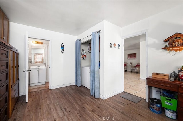 117 N Morada Ave, West Covina, CA 91790 - hallway with dark wood-style floors and baseboards