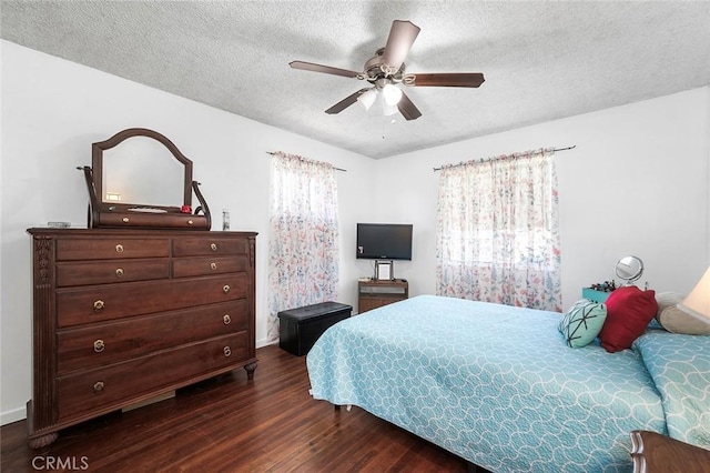 117 N Morada Ave, West Covina, CA 91790 - bedroom featuring dark wood finished floors, a textured ceiling, and a ceiling fan