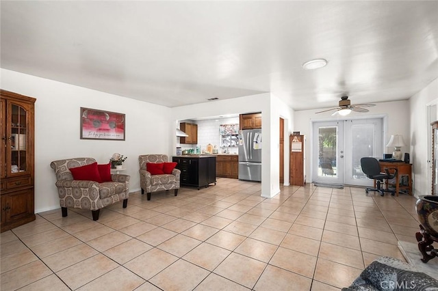 117 N Morada Ave, West Covina, CA 91790 - living room with light tile patterned floors, an office area, french doors, and healthy amount of natural light