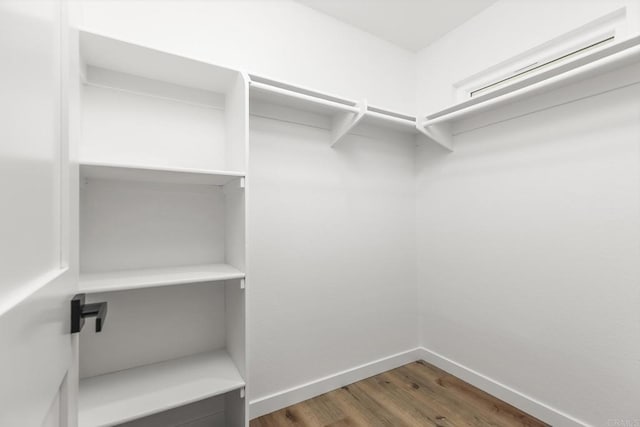 4514 Dawson Ave Unit 2, San Diego, CA 92115 - walk in closet featuring wood finished floors