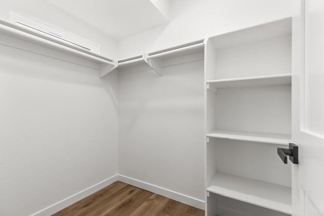 4514 Dawson Ave Unit 2, San Diego, CA 92115 - walk in closet featuring wood finished floors