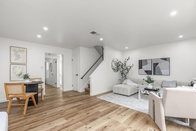 4514 Dawson Ave Unit 2, San Diego, CA 92115 - living room featuring stairway, light wood finished floors, and recessed lighting