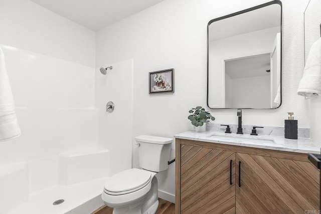 4514 Dawson Ave Unit 2, San Diego, CA 92115 - bathroom featuring vanity, a shower, and wood finished floors