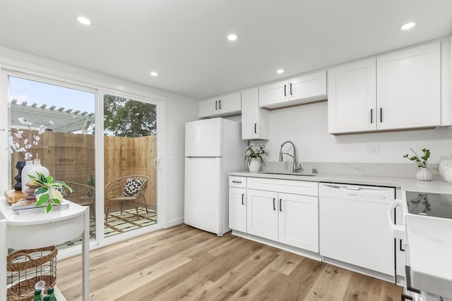 4514 Dawson Ave Unit 2, San Diego, CA 92115 - kitchen featuring white appliances, white cabinets, light wood-type flooring, and recessed lighting