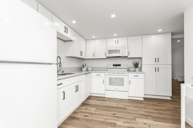 4514 Dawson Ave Unit 2, San Diego, CA 92115 - kitchen featuring white appliances, light wood finished floors, light countertops, white cabinets, and recessed lighting