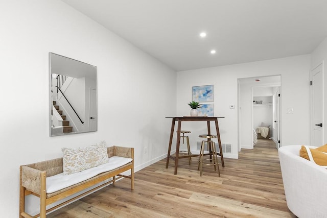 4514 Dawson Ave Unit 4, San Diego, CA 92115 - sitting room with light wood-type flooring, stairs, and recessed lighting