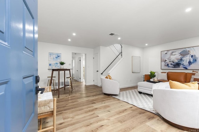 4514 Dawson Ave Unit 4, San Diego, CA 92115 - living room featuring stairs, light wood-style floors, and recessed lighting