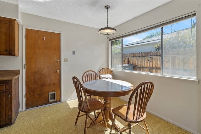 2151 W Pico Ave, Fresno, CA 93705 - dining area featuring a textured ceiling