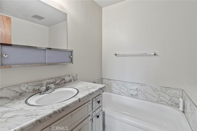 2151 W Pico Ave, Fresno, CA 93705 - bathroom featuring a bath and vanity