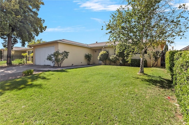 2151 W Pico Ave, Fresno, CA 93705 - ranch-style home with stucco siding, an attached garage, and driveway