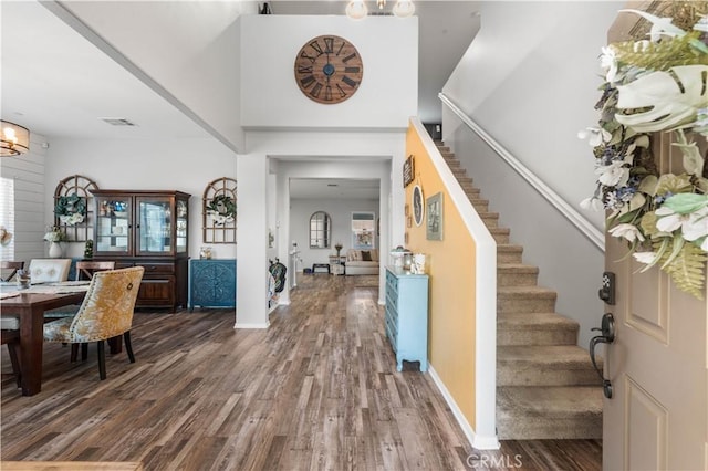 3558 Mt San Gorgonia Ave, Rosamond, CA 93560 - entryway with wood finished floors, stairway, healthy amount of natural light, and a high ceiling