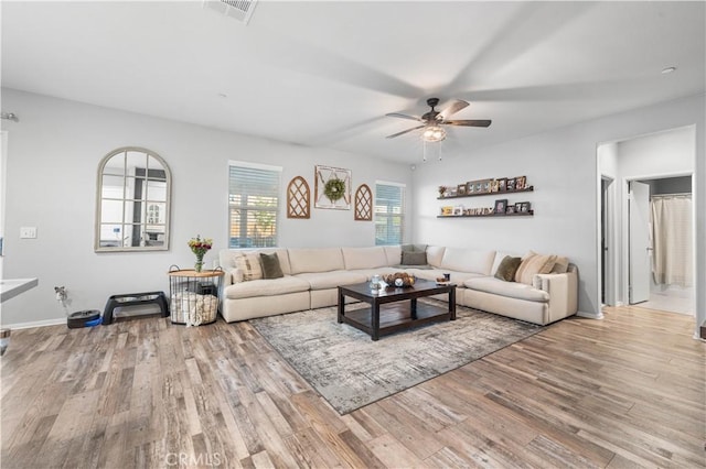 3558 Mt San Gorgonia Ave, Rosamond, CA 93560 - living room featuring wood finished floors and a ceiling fan
