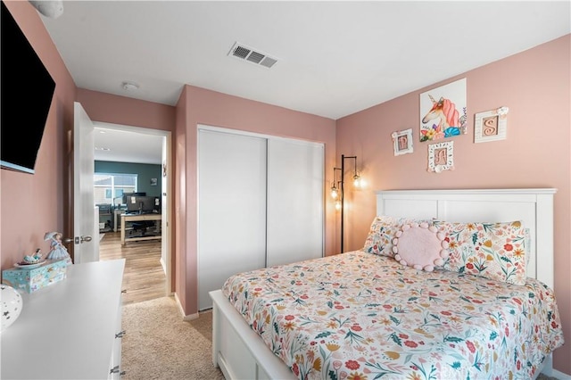 3558 Mt San Gorgonia Ave, Rosamond, CA 93560 - bedroom with a closet, a desk, and light colored carpet