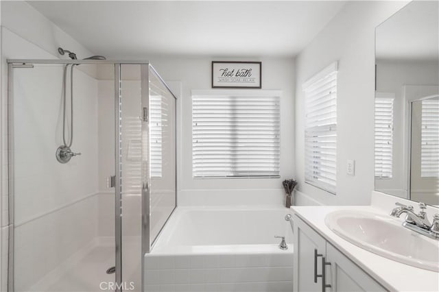 3558 Mt San Gorgonia Ave, Rosamond, CA 93560 - bathroom featuring vanity, a bath, and a shower stall