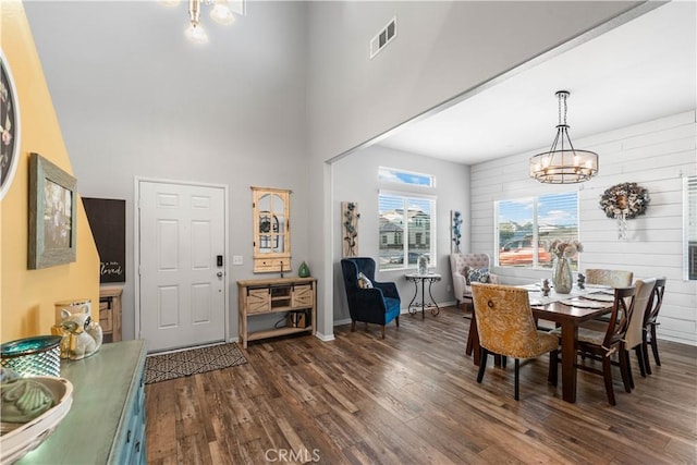 3558 Mt San Gorgonia Ave, Rosamond, CA 93560 - dining room featuring a chandelier, dark wood finished floors, and a high ceiling