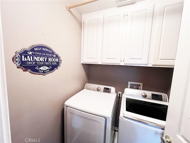 28303 Sycamore Dr, Saugus, CA 91350 - laundry area featuring washer and dryer and cabinet space