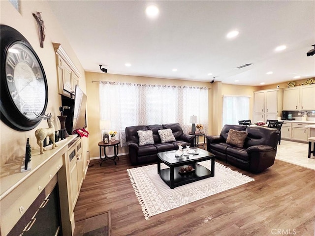 28303 Sycamore Dr, Saugus, CA 91350 - living room with light wood-style floors and recessed lighting
