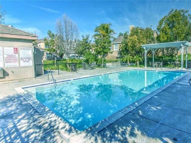 28303 Sycamore Dr, Saugus, CA 91350 - community pool with a pergola and a patio area