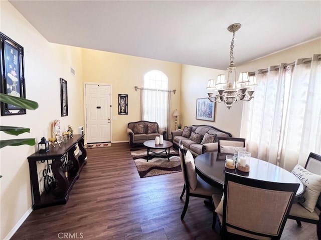 28303 Sycamore Dr, Saugus, CA 91350 - dining space with a chandelier and dark wood-style floors