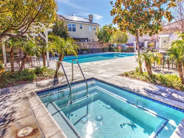 28303 Sycamore Dr, Saugus, CA 91350 - community pool featuring a hot tub