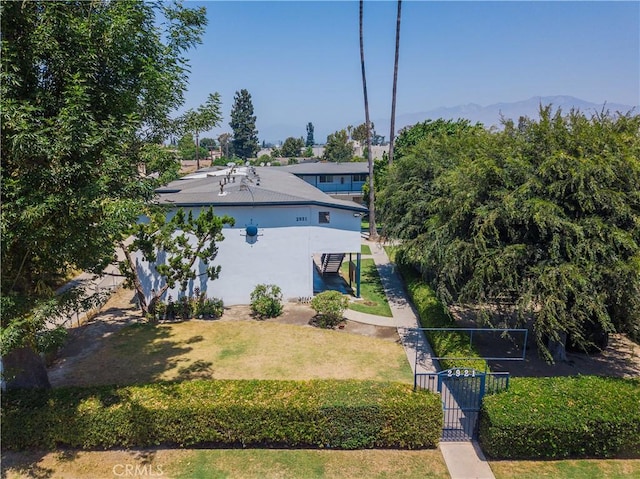 2921 Allgeyer Ave, El Monte, CA 91732 - view of front of property featuring stucco siding, a gate, and a mountain view