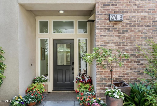 274 S Prospect Ave, Tustin, CA 92780 - doorway to property with brick siding and stucco siding