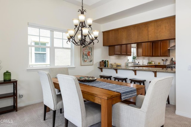274 S Prospect Ave, Tustin, CA 92780 - dining room with a chandelier, light colored carpet, and healthy amount of natural light