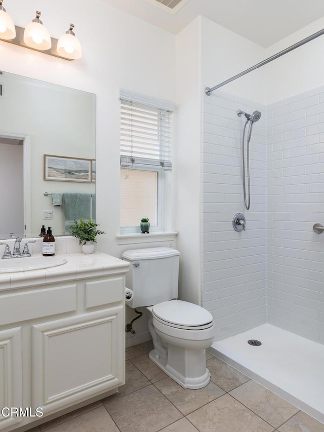 274 S Prospect Ave, Tustin, CA 92780 - full bathroom with a tile shower, vanity, and tile patterned floors