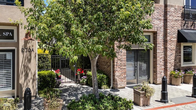274 S Prospect Ave, Tustin, CA 92780 - entrance to property featuring a gate and brick siding