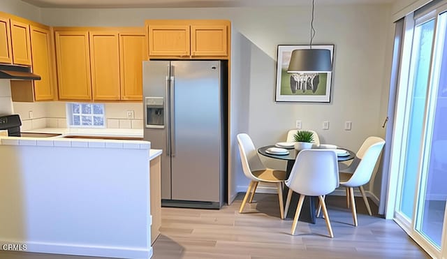 1123 Paseo Las Nubes, Oxnard, CA 93030 - kitchen featuring stainless steel fridge, under cabinet range hood, electric range, light brown cabinets, and light wood-type flooring