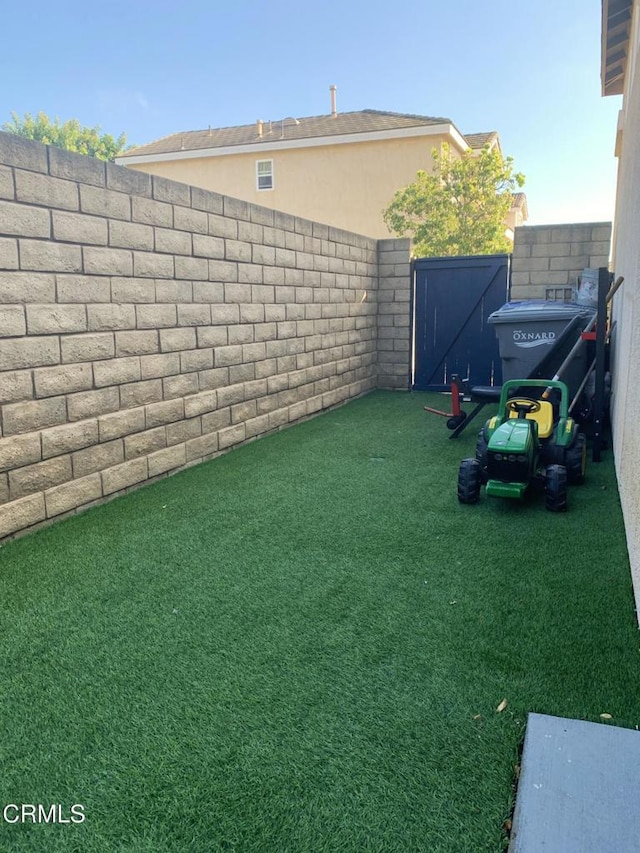 1123 Paseo Las Nubes, Oxnard, CA 93030 - fenced backyard featuring a gate