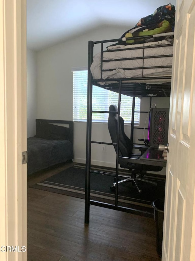 1123 Paseo Las Nubes, Oxnard, CA 93030 - bedroom featuring wood finished floors, vaulted ceiling, and a desk