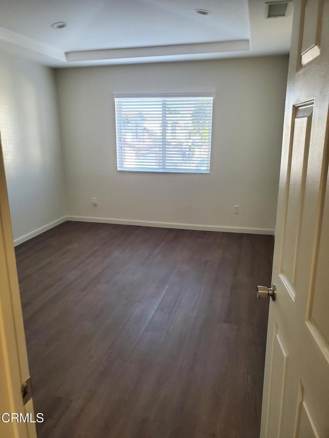 1123 Paseo Las Nubes, Oxnard, CA 93030 - empty room featuring dark wood-style flooring and baseboards